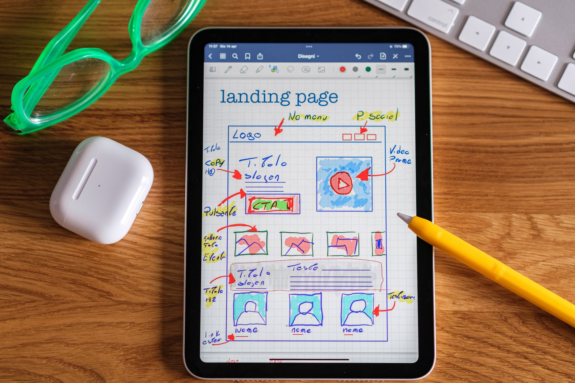 Landing Page Design Best Practices: One Offer, One Path Forward 1 Close-up of tablet showing a hand-drawn landing page design, ideal for web development concepts.